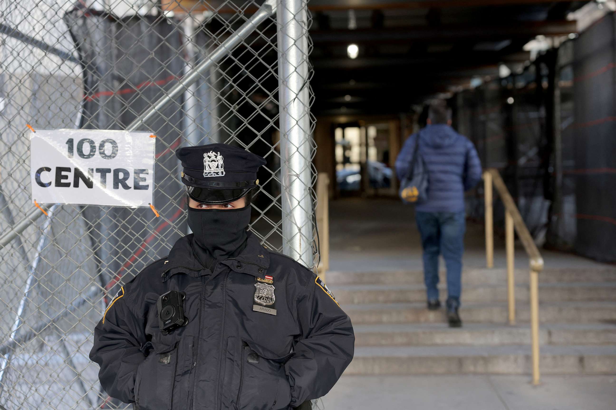 PHOTO: NYPD officer stands at the entrance to the Manhattan Criminal Court after former U.S. President Donald Trump's indictment by a Manhattan grand jury following a probe into hush money paid to porn star Stormy Daniels, in New York City, April 3, 2023.