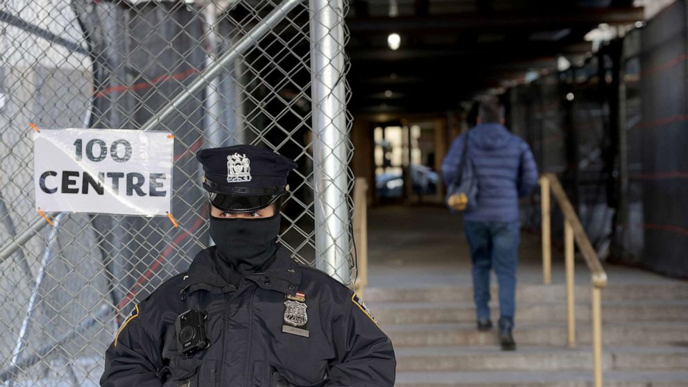 PHOTO: NYPD officer stands at the entrance to the Manhattan Criminal Court after former U.S. President Donald Trump's indictment by a Manhattan grand jury following a probe into hush money paid to porn star Stormy Daniels, in New York City, April 3, 2023.