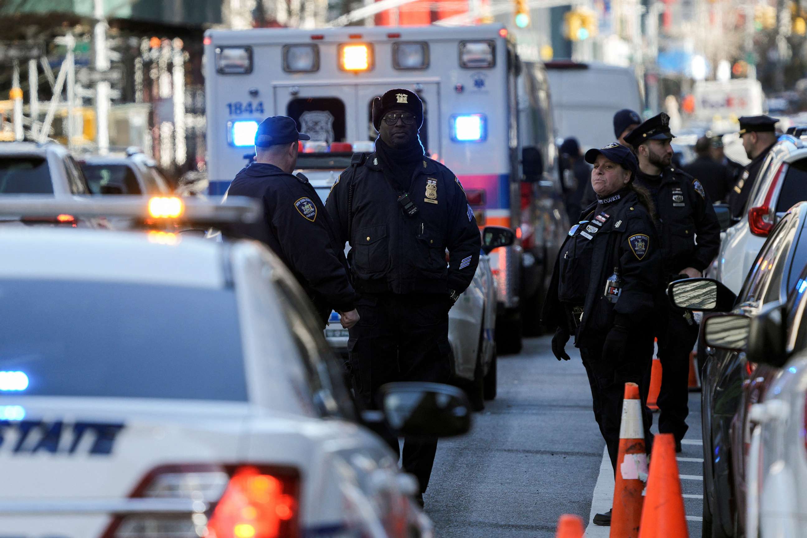 PHOTO: NYS Court officers stand guard near the Manhattan criminal court, after former President Donald Trump's indictment by a Manhattan grand jury following a probe into hush money paid to porn star Stormy Daniels, in New York City, April 3, 2023.