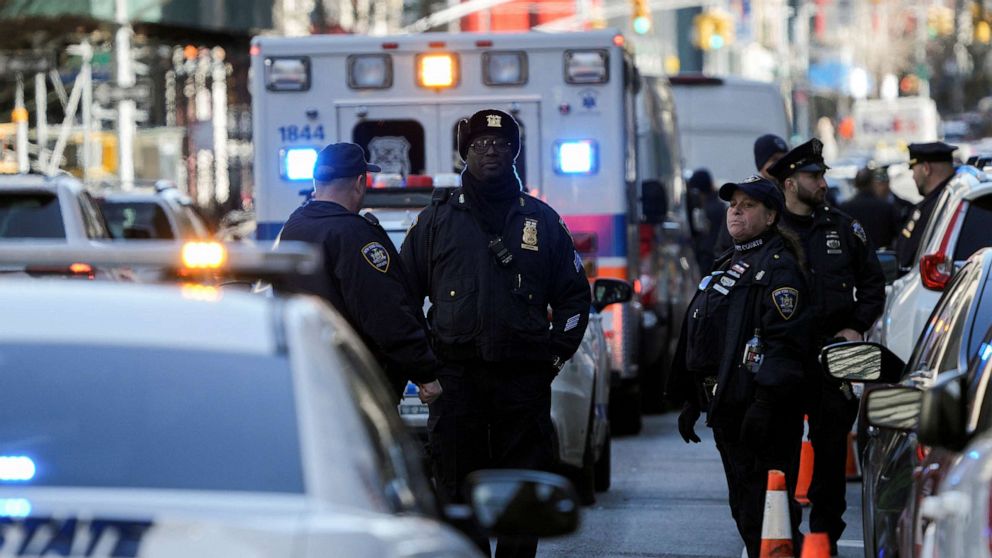 PHOTO: NYS Court officers stand guard near the Manhattan criminal court, after former President Donald Trump's indictment by a Manhattan grand jury following a probe into hush money paid to porn star Stormy Daniels, in New York City, April 3, 2023.