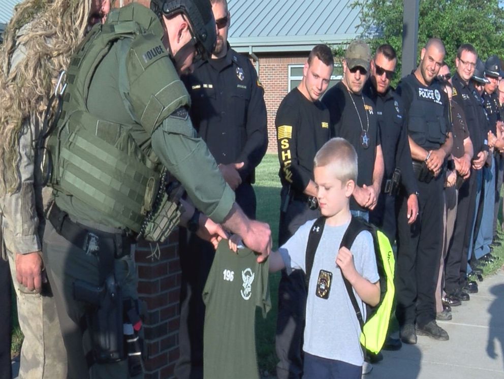 PHOTO: Five-year-old Dakota Pitts returned to school for the first time since his father's death in the line of duty. But he wasn't alone.