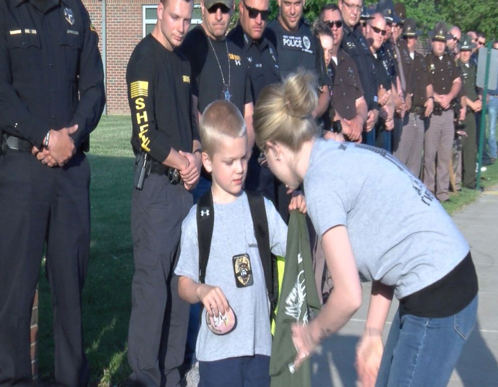 PHOTO: Five-year-old Dakota Pitts returned to school for the first time since his father's death in the line of duty. But he wasn't alone.