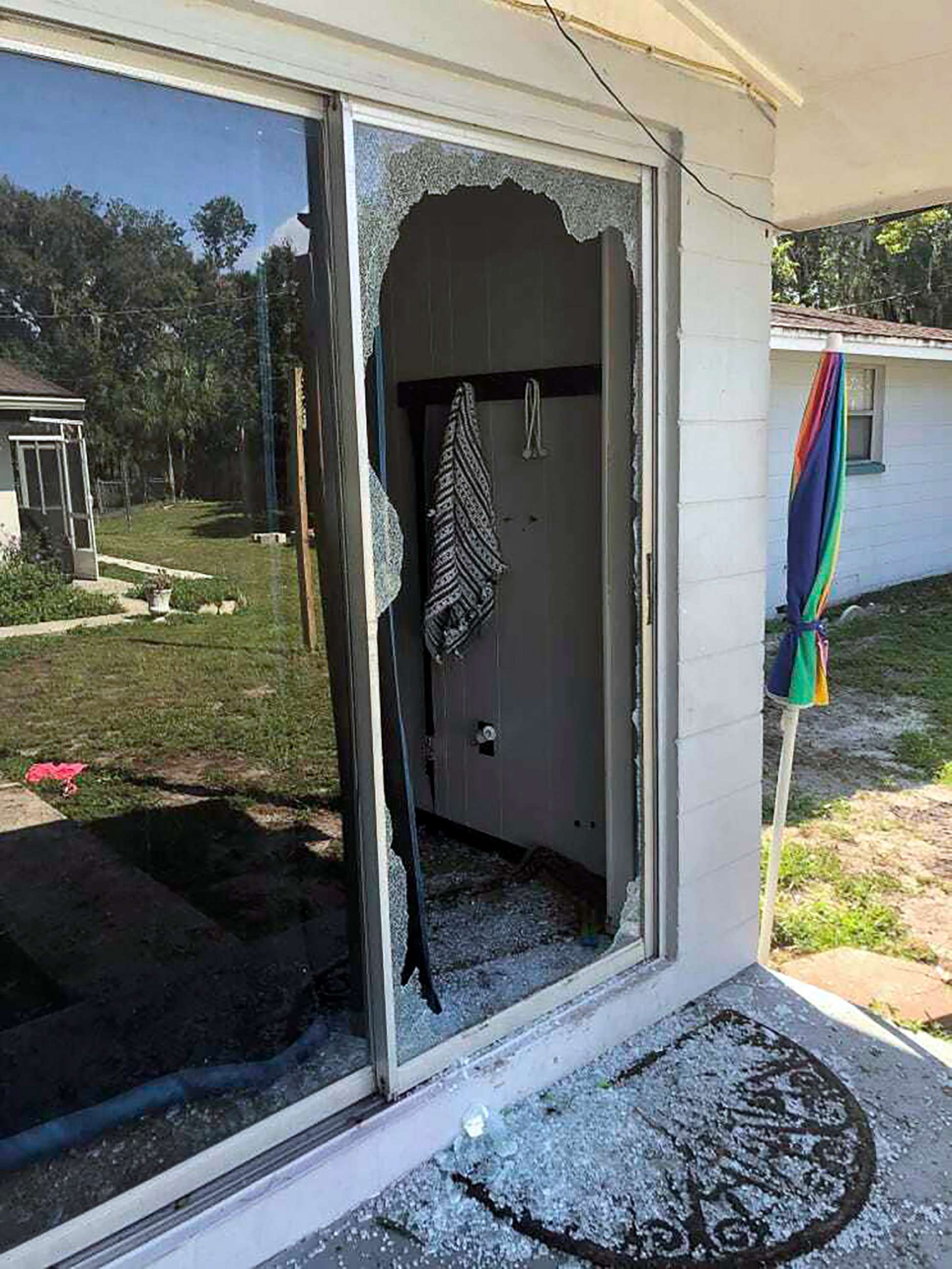 PHOTO: Damage to the back of a Polk County, Fla., house is pictured in an image provided by the Polk County Sheriff's Office showing where a sheriff's lieutenant entered the house and exchanged fire with a suspect in Lakeland, Fla., Sept. 5, 2021.