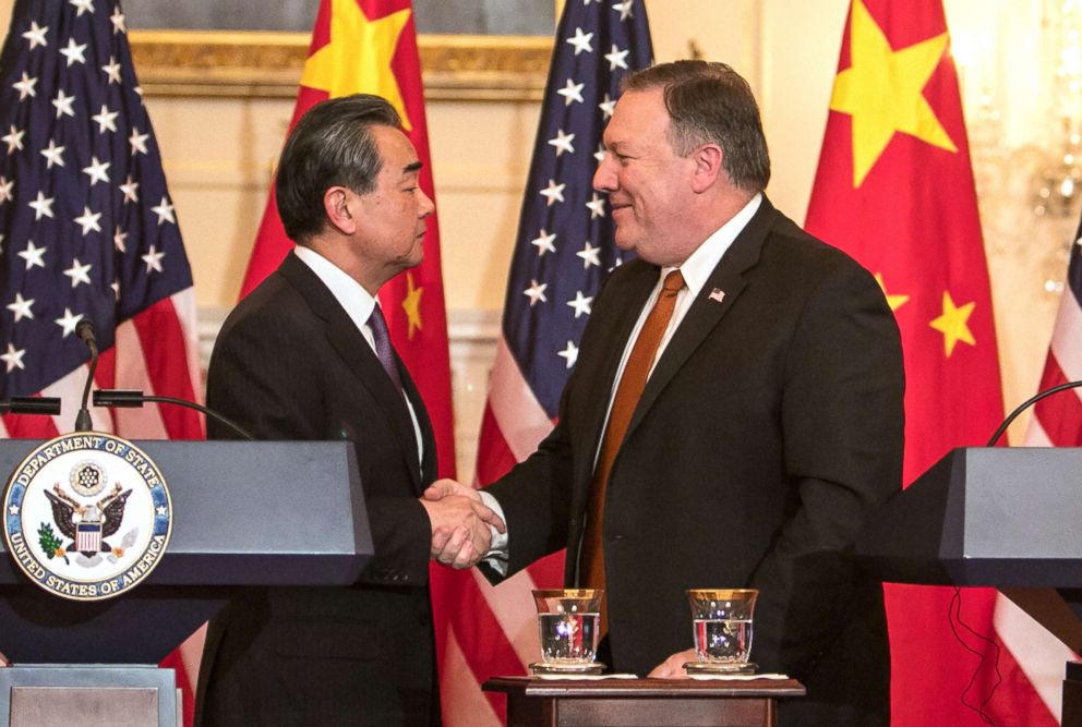 PHOTO: Chinese Foreign Minister Wang Yi and U.S. Secretary of State Mike Pompeo shake hands during a brief press conference in the Benjamin Franklin Room at the State Department's headquarters on May 23, 2018, in Washington, D.C. 