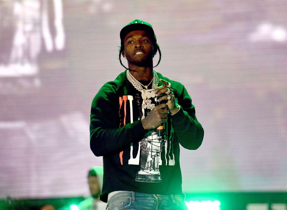 PHOTO: Rapper Pop Smoke performs onstage during day 2 of the Rolling Loud Festival at Banc of California Stadium on December 15, 2019 in Los Angeles.