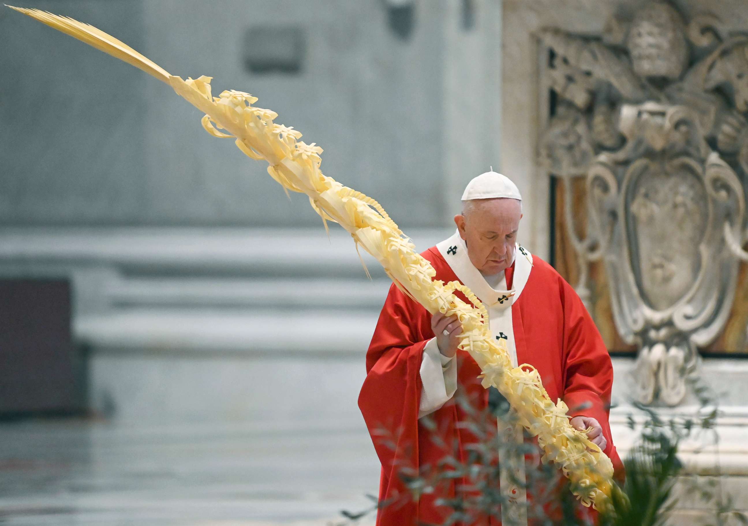 PHOTO: Pope Francis holds a palm branch as he celebrates Palm Sunday Mass behind closed doors in St. Peter's Basilica, at the Vatican, April 5, 2020, during the lockdown aimed at curbing the spread of the COVID-19 infection.