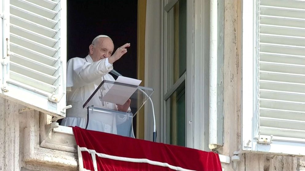 PHOTO: In this screen grab from a Vatican Media video, Pope Francis raises his hand in greeting as he delivers the Angelus hours before being admitted to Gemelli hospital for colon surgery, at the Vatican, July 4, 2021.
