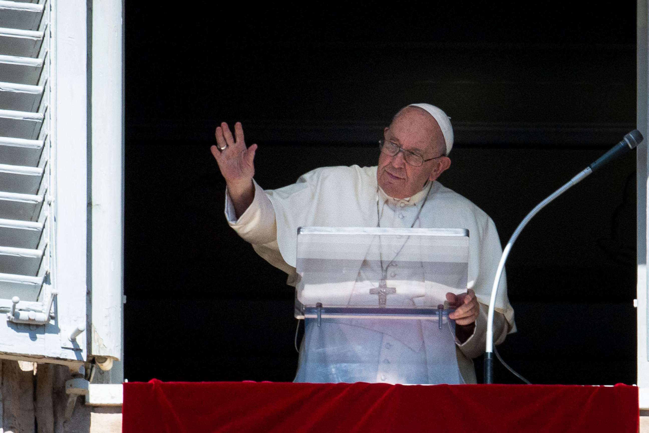 PHOTO: Pope Francis waves from the window of the Apostolic Palace during the weekly Angelus prayer in the Vatican, Oct. 2, 2022.