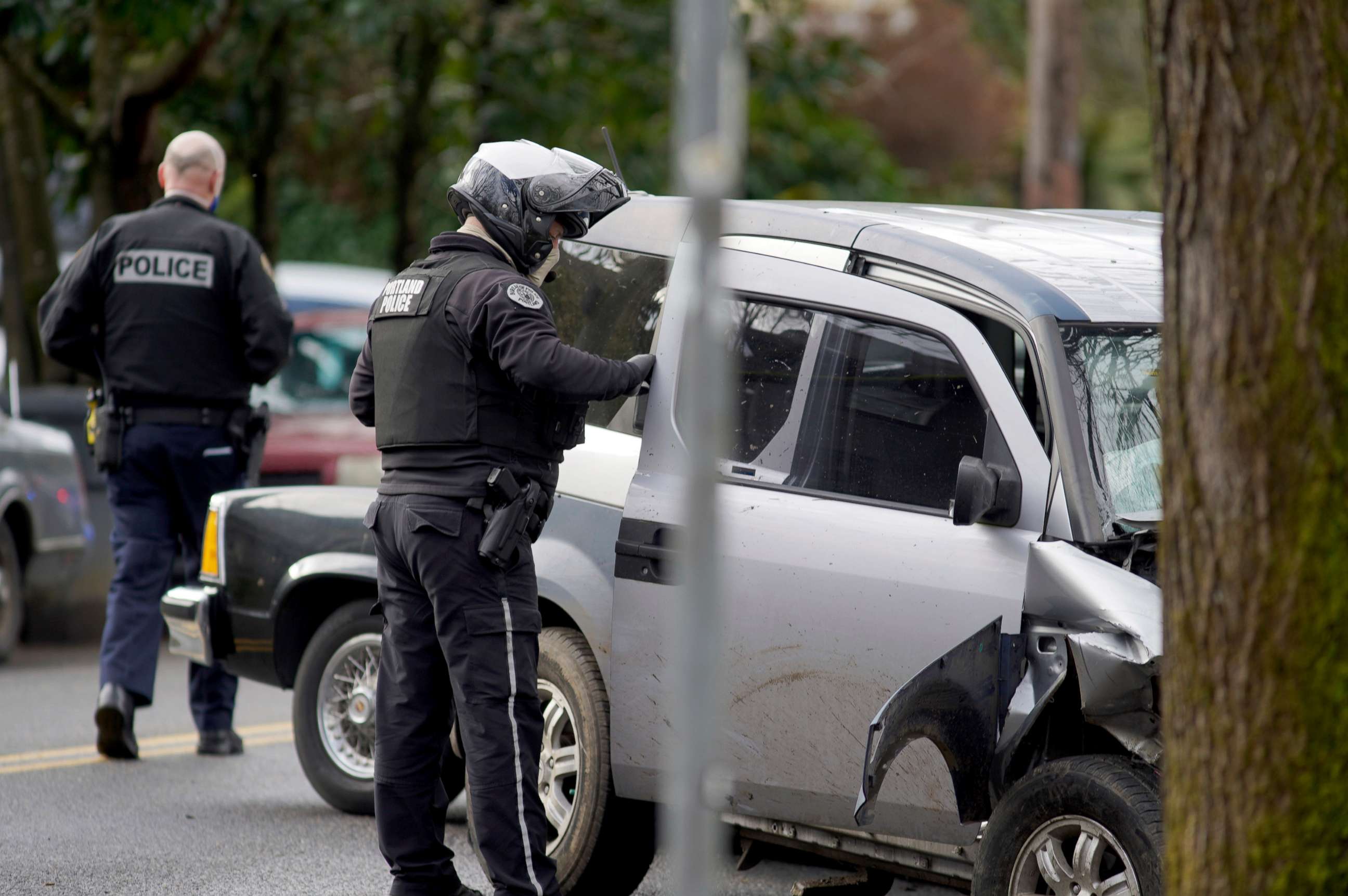 PHOTO: Police investigate after a driver struck and injured at least five people over a 20-block stretch of Southeast Portland, Ore., before crashing and fleeing on Monday, Jan. 25, 2021, according to witnesses.