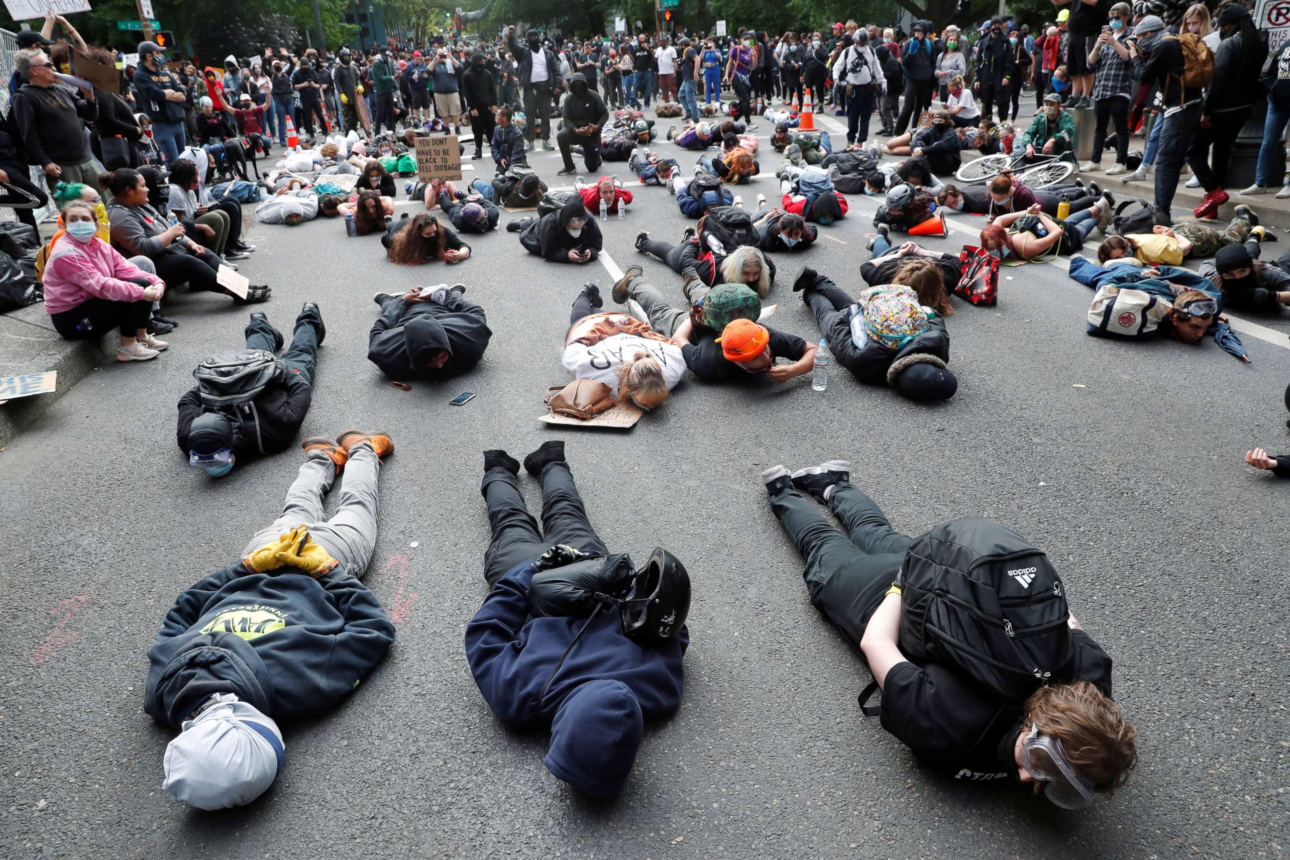 PHOTO: Protesters laying on the ground chant "I can't breathe" at a rally against the death in Minneapolis police custody of George Floyd, in Portland, Oregon, May 31, 2020.