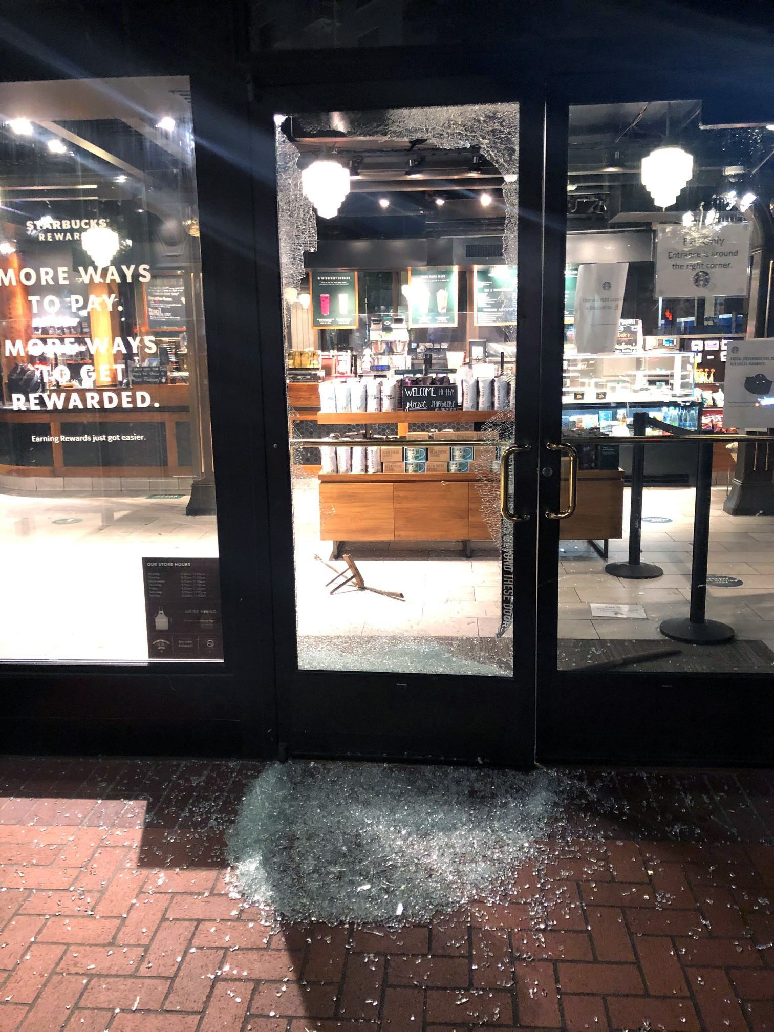 PHOTO: Protesters smashed windows at a Starbucks and other businesses in downtown Portland, on May 25, 2021.