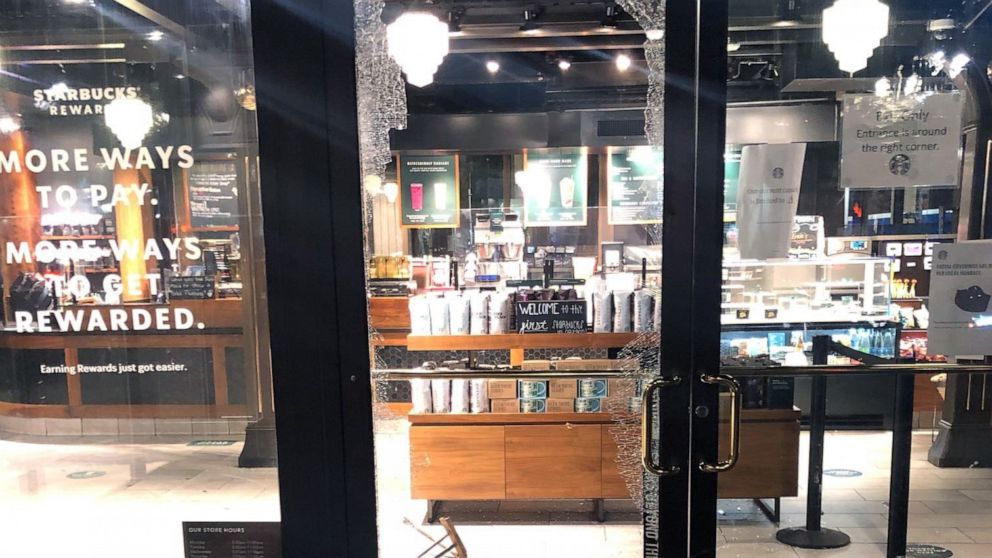 PHOTO: Protesters smashed windows at a Starbucks and other businesses in downtown Portland, on May 25, 2021.