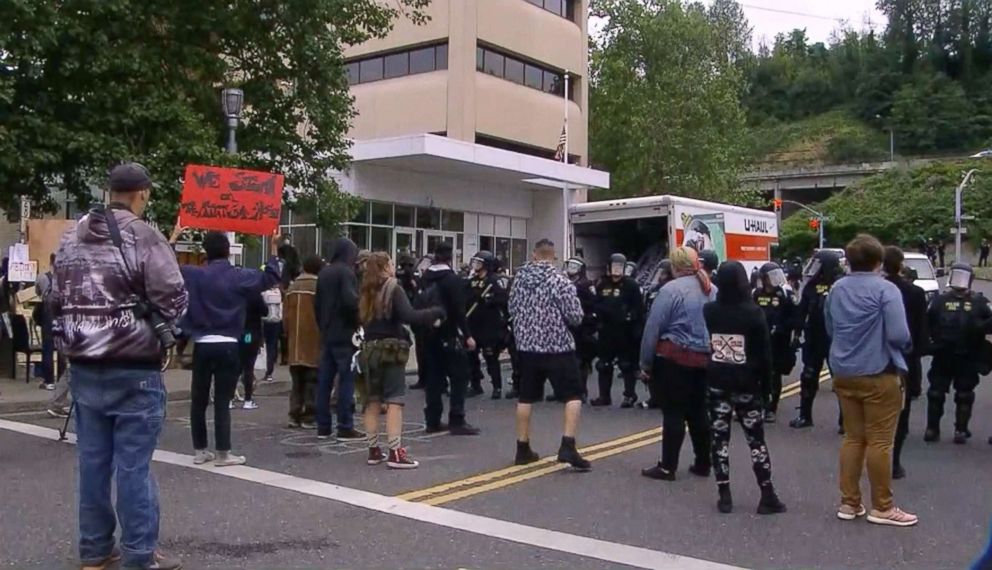 PHOTO: Police and protesters face off outside the U.S. Immigration and Customs Enforcement office in Portland, Ore., June 28, 2018, where demonstrations have been held round-the-clock since June 17.