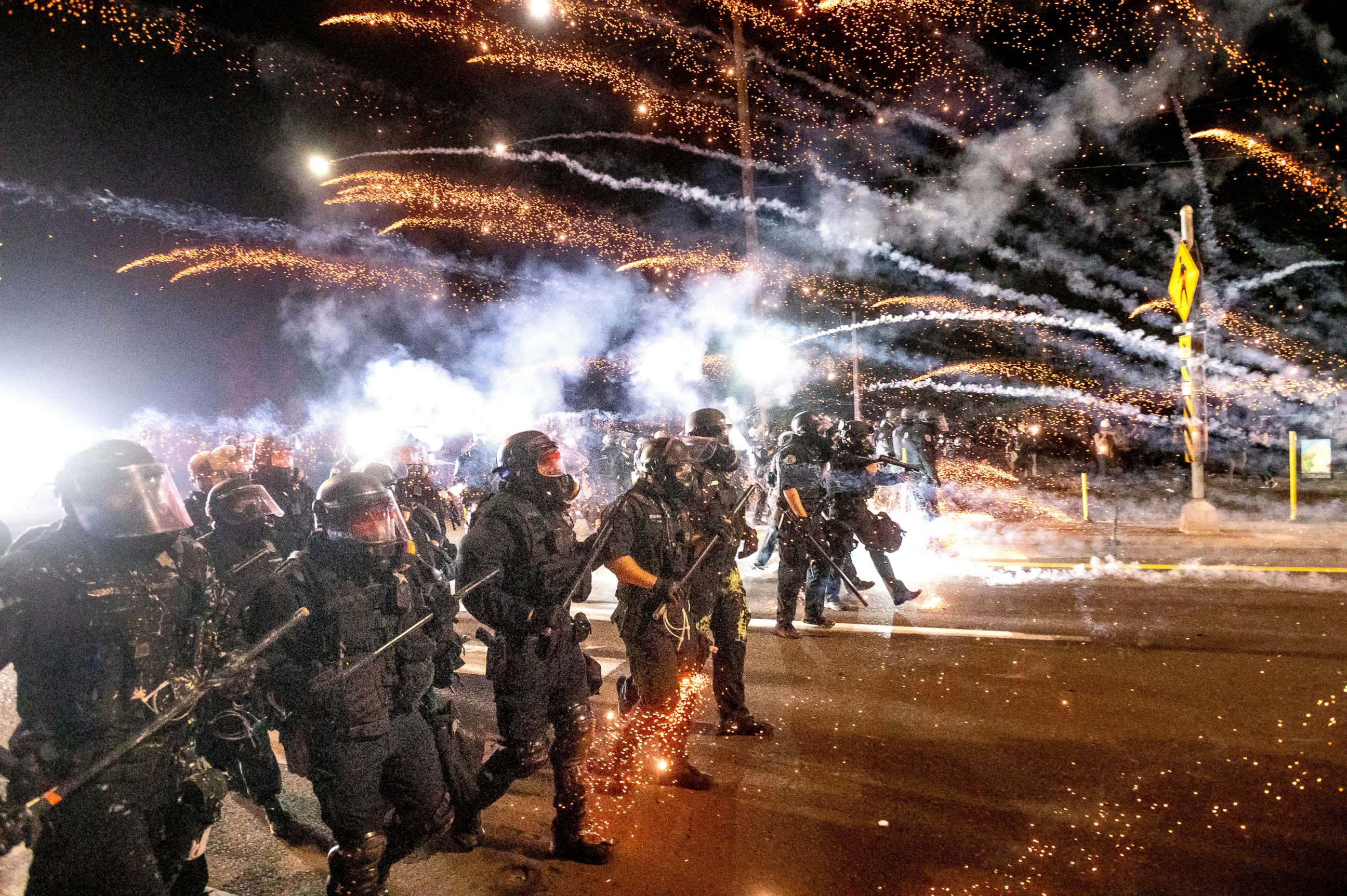 PHOTO: FILE - In this Sept. 5, 2020, file photo, police use chemical irritants and crowd control munitions to disperse protesters during a demonstration in Portland, Ore. 