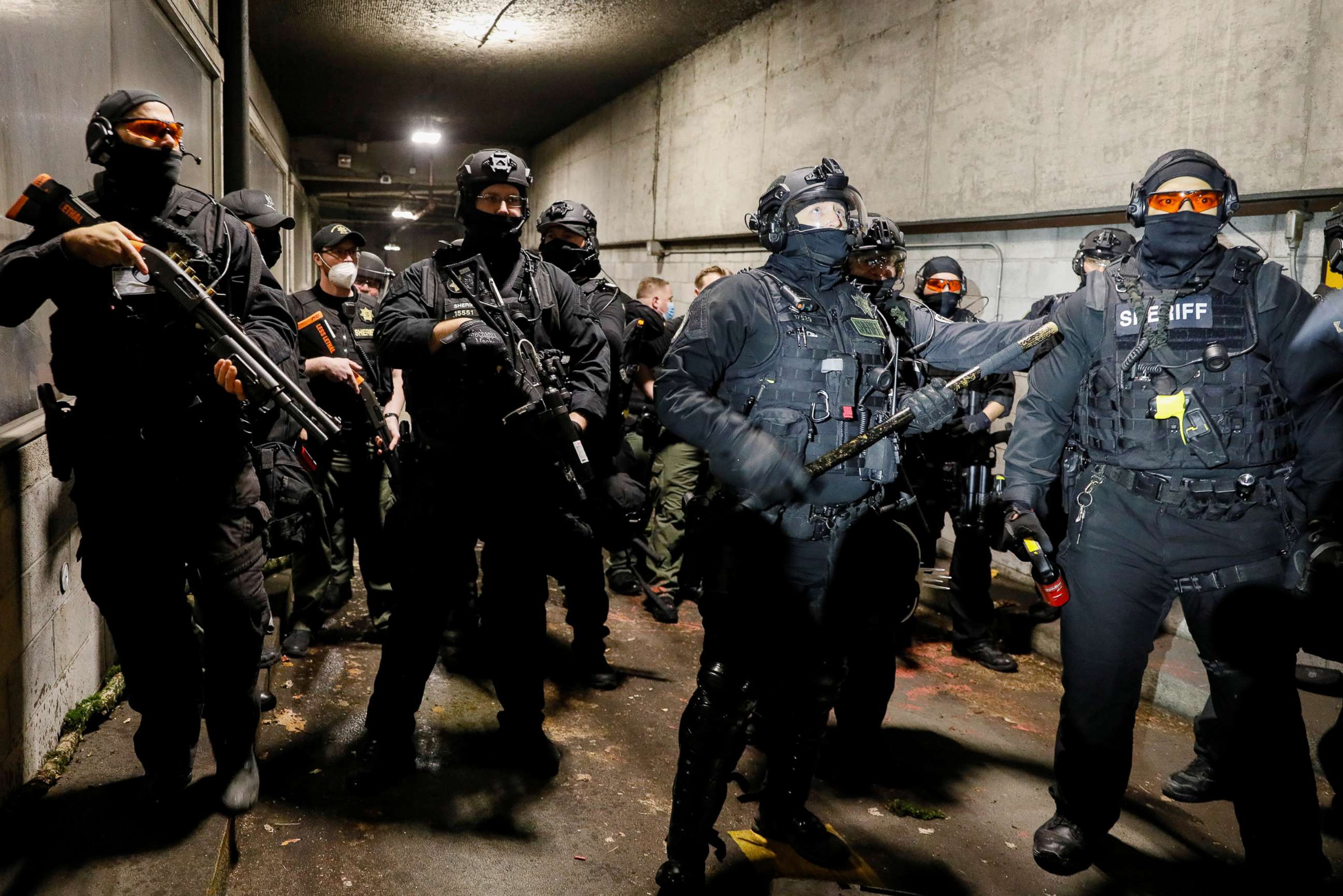 PHOTO: Police advance on protesters at the Justice Center after the full acquittal verdict of Kyle Rittenhouse in his Wisconsin fatal shootings trial, in Portland, Ore., Nov. 19, 2021.