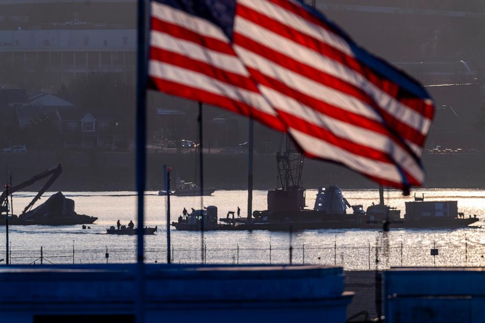 PHOTO: Salvage crews work near the wreckage site in the Potomac River of a mid-air collision between an American Airlines jet and a Black Hawk helicopter, at Ronald Reagan Washington National Airport, Feb. 4, 2025, in Arlington, Va.