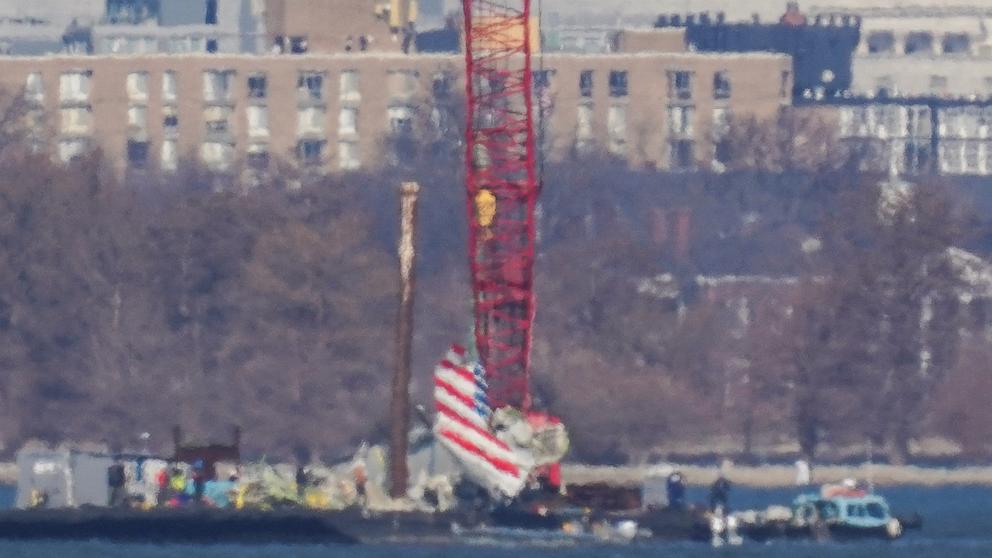 PHOTO: Crews work to retrieve the wreckage of American Eagle flight 5342 in the Potomac River, in the aftermath of the collision of American Eagle flight 5342 and a Black Hawk helicopter that crashed into the river, Feb. 4, 2025, as seen from Virginia.
