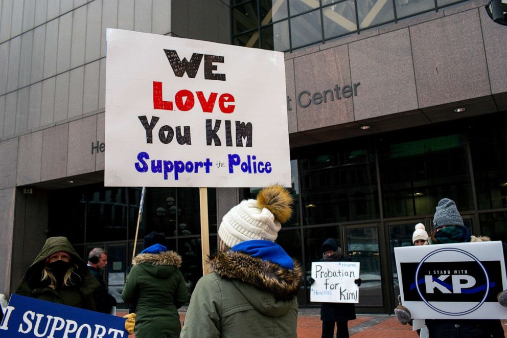 PHOTO: A group of demonstrators stand outside of Hennepin County Government Center calling for Kim Potter's release on probation, Feb. 18, 2022, in Minneapolis.