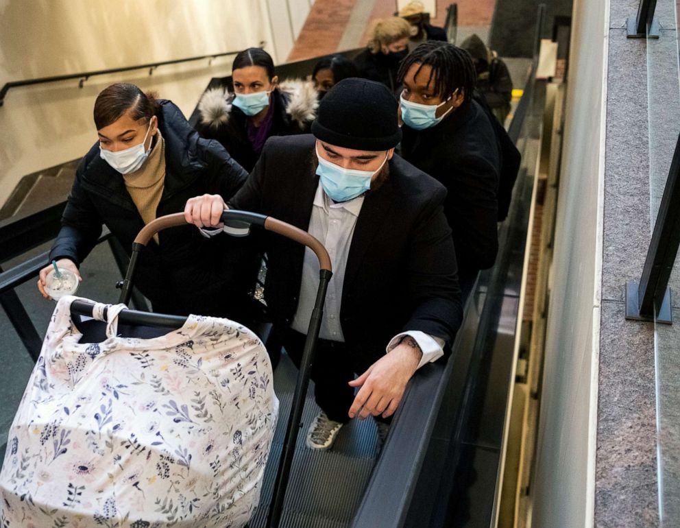PHOTO: Dallas Bryant, right, brother of Daunte Wright, arrives with family at the Hennepin County Government Center, Dec. 8, 2021 in Minneapolis.