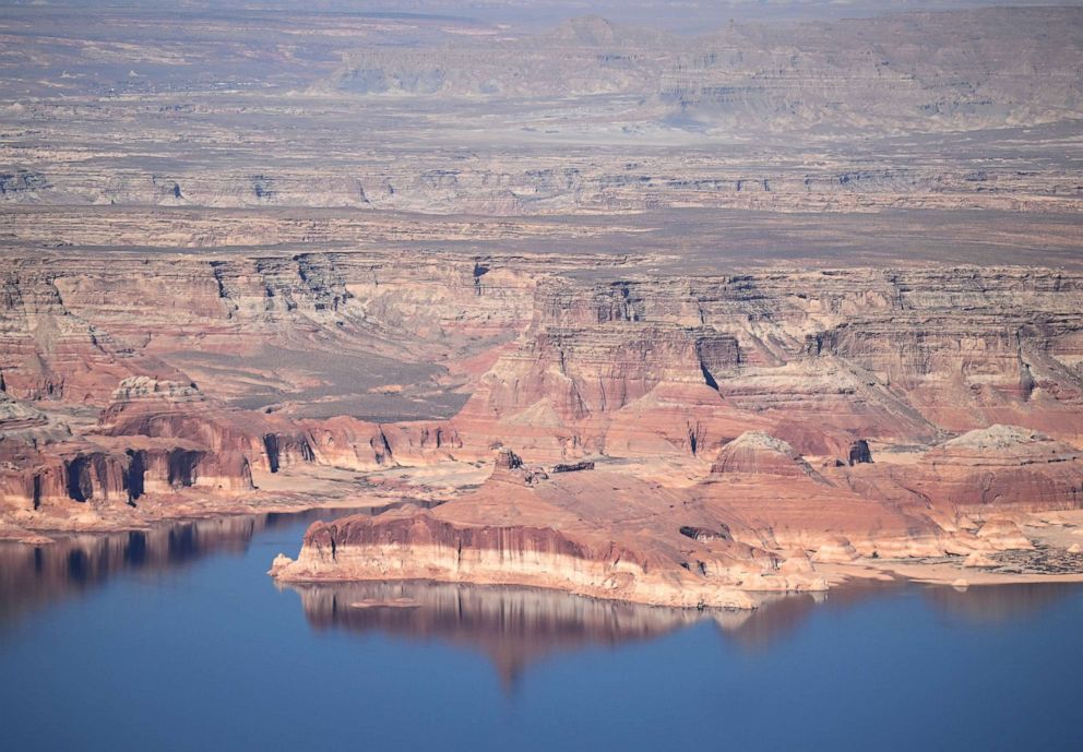 PHOTO: A bathtub ring seen above the waterline around Lake Powell was created during drought that reduced the flow of the Colorado River, April 15, 2023, in Lake Powell, Utah.