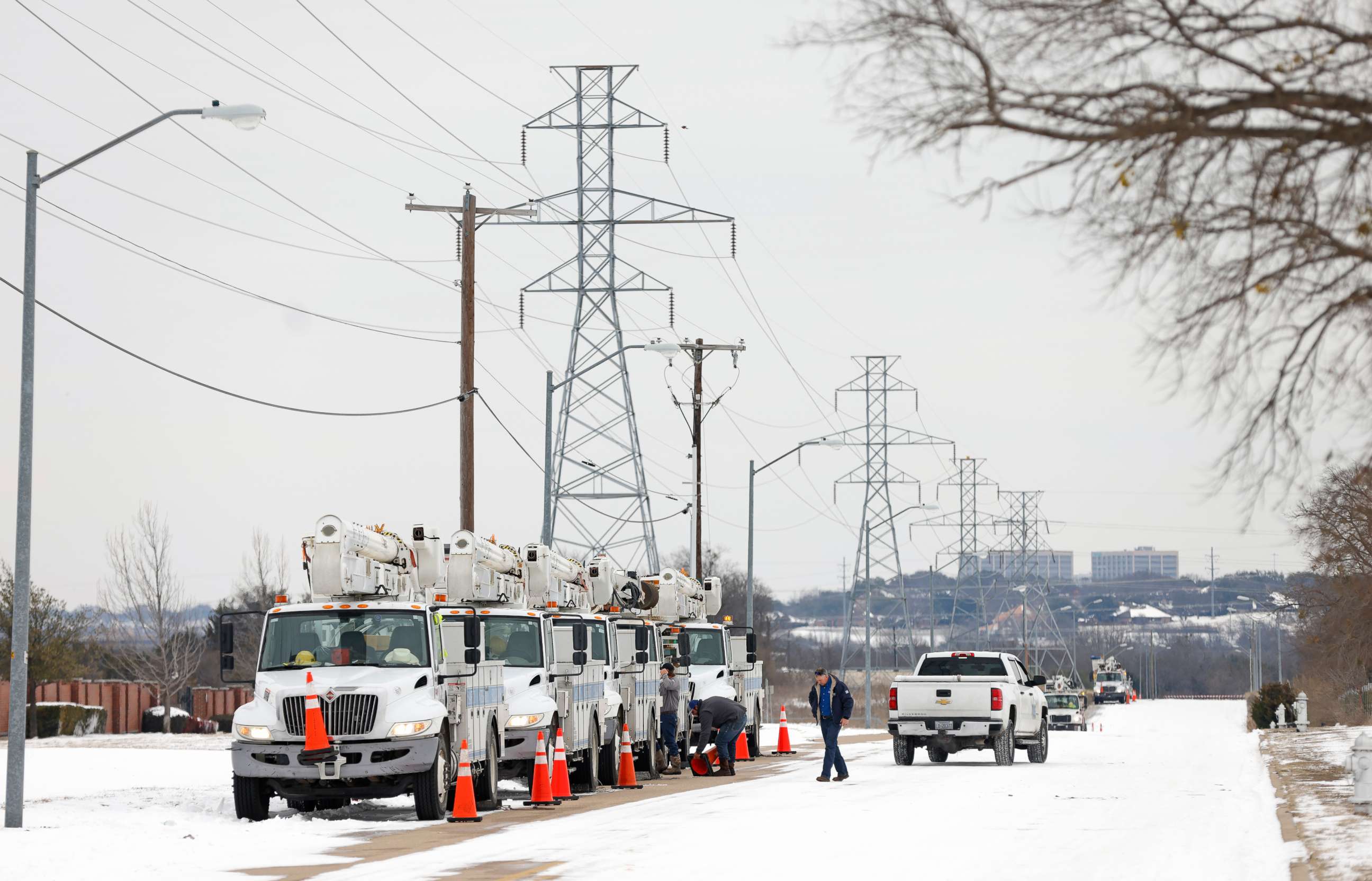 PHOTO: Pike Electric service trucks line up after a snow storm on Feb. 16, 2021, in Fort Worth, Texas.