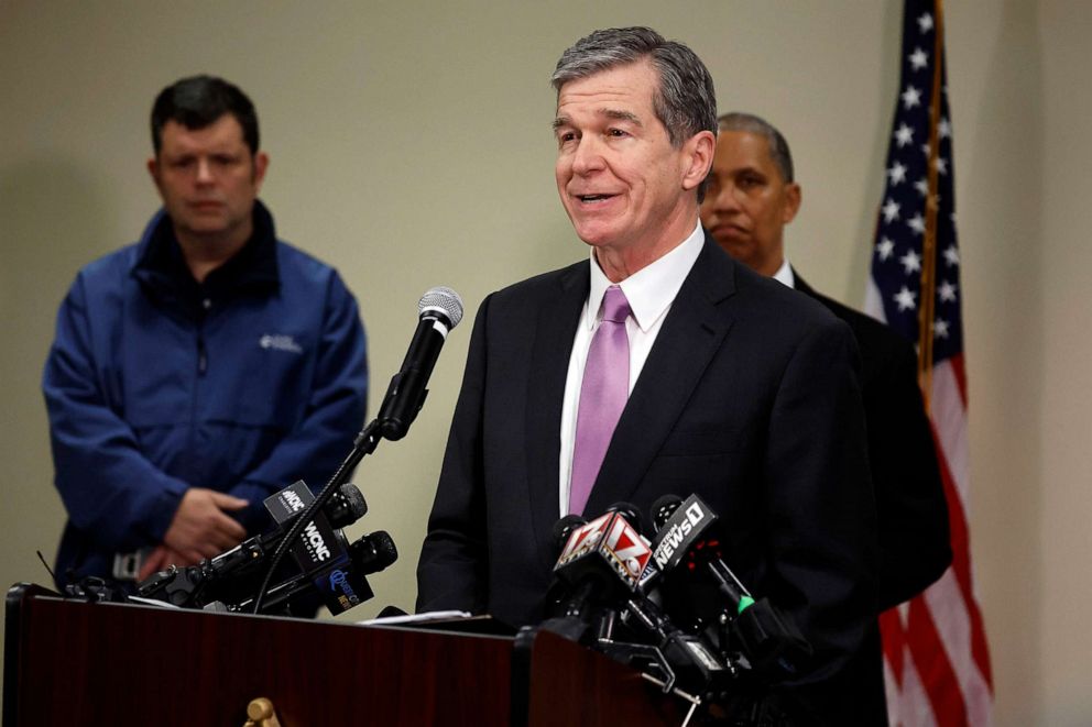 PHOTO: Governor Roy Cooper speaks at a news conference at the Moore County Sheriffs office regarding an attack on critical infrastructure that has caused a power outage to many around Southern Pines, N.C.
