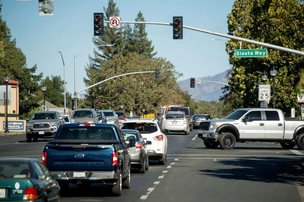 PHOTO: Vehicles backs up on Highway 12 as traffic signals are dark during a power outage, Oct. 9, 2019, in Boyes Hot Springs, Calif.