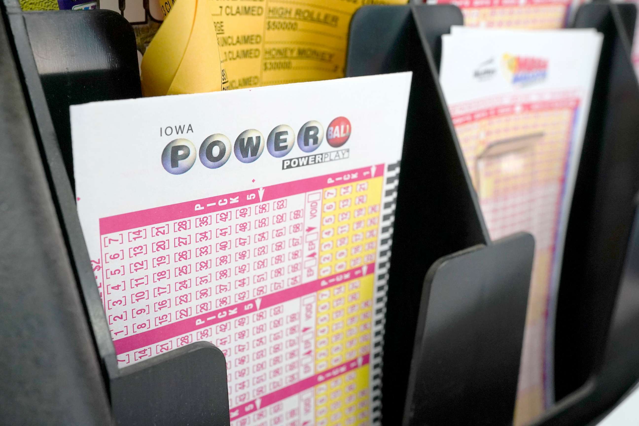 PHOTO: Blank forms for the Powerball lottery sit in a bin at a local grocery store, in Des Moines, Iowa, July 12, 20121.