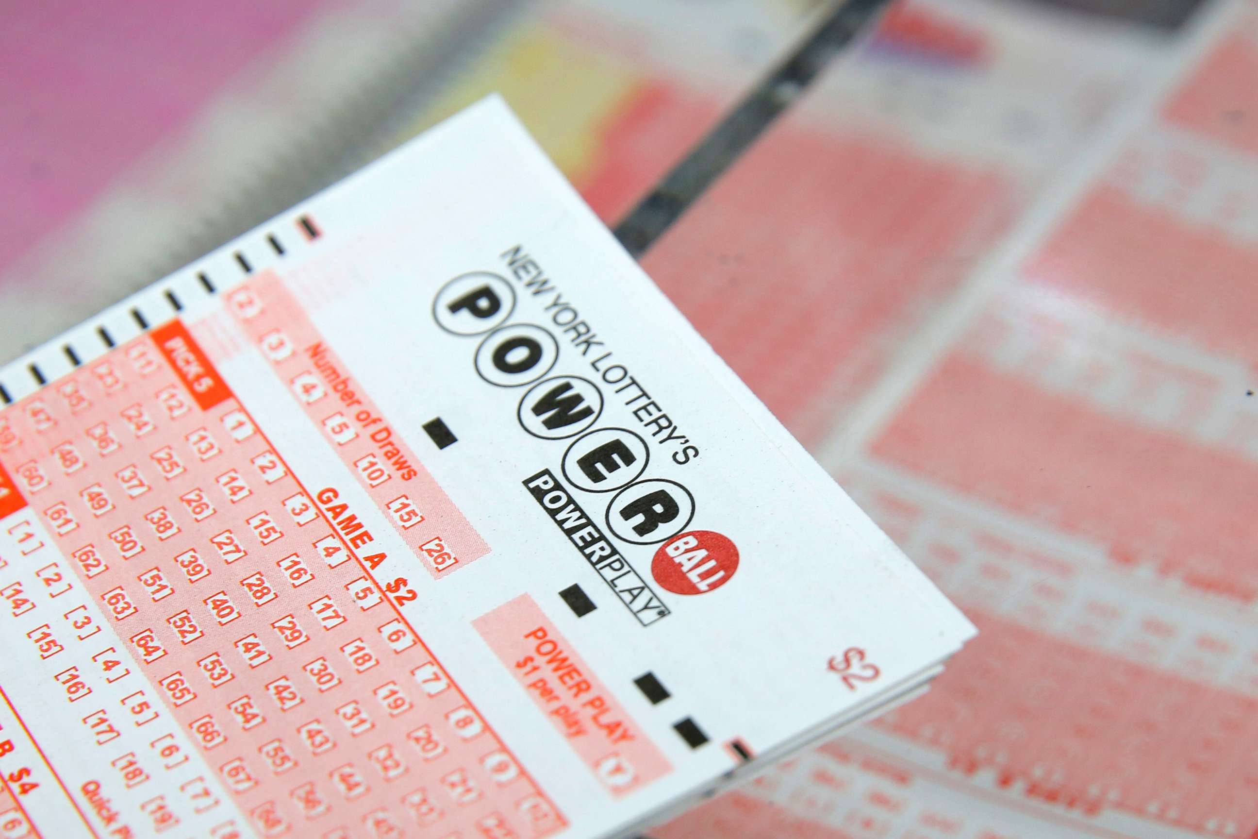PHOTO: A ticket for the Powerball sits on a counter in a store in New York, Feb. 22, 2017. 