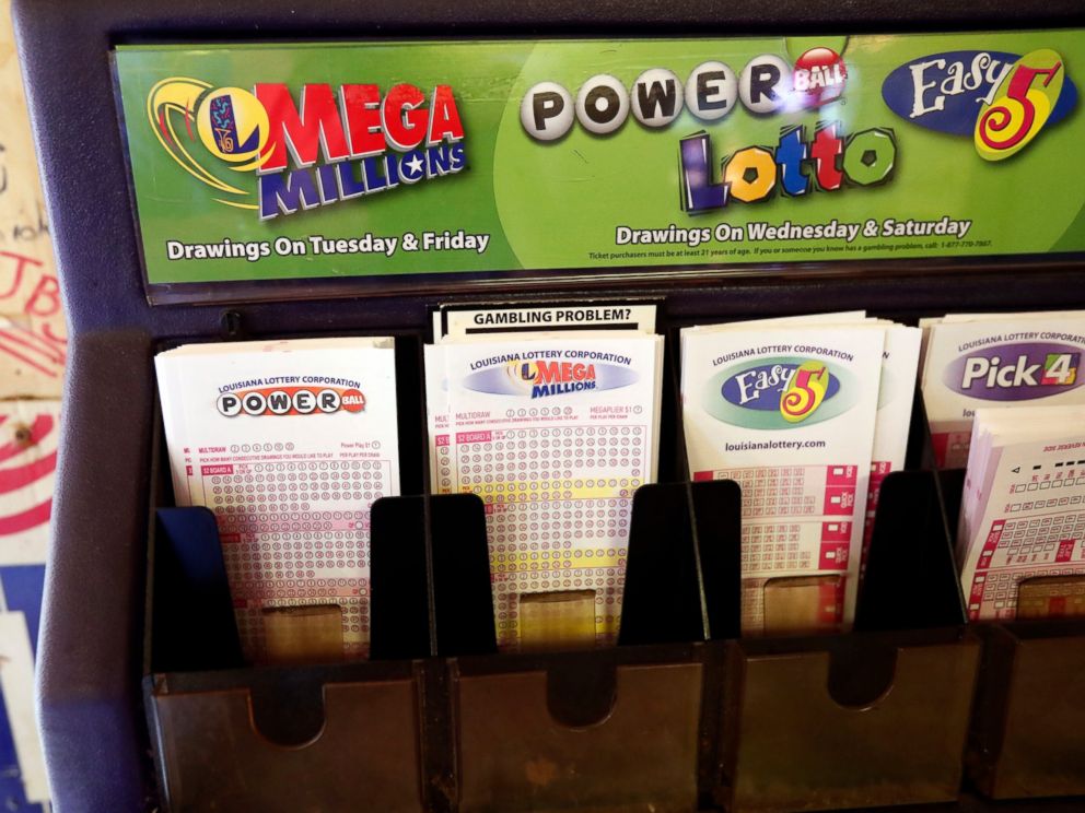 PHOTO: In this archival photo of Tuesday, October 23, 2018, lottery forms for the Louisiana Mega Millions, Powerball and other lottery games fill the drawer of the World Bar and Grill, in Delta, in Louisiana, a few miles from the Mississippi-Louisiana line of state.