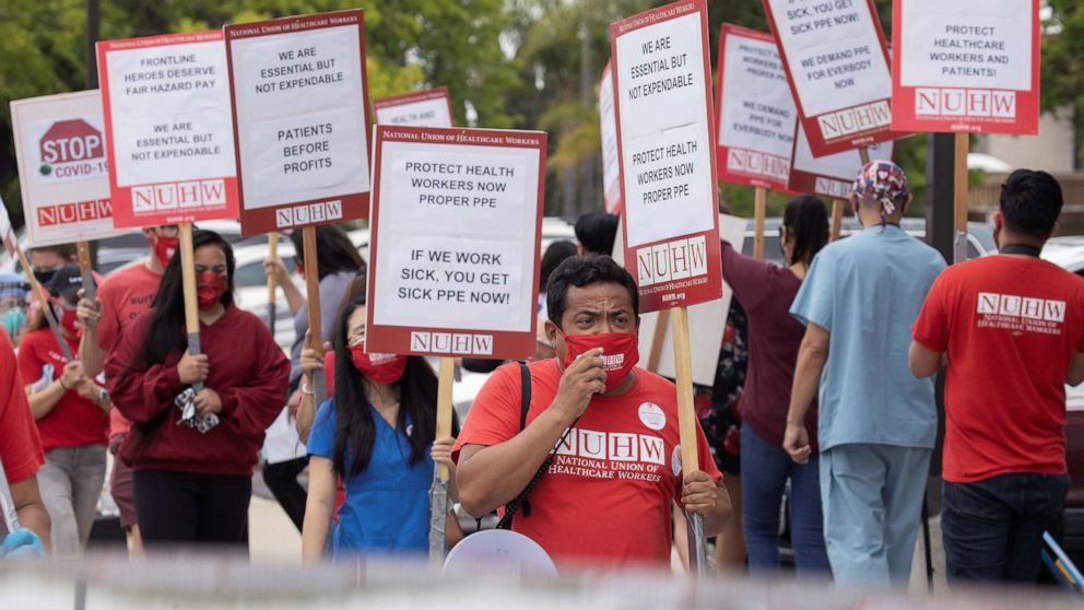 PHOTO: Workers at Kindred Hospital Westminster protest outside the hospital to demand better protection for them and their patients inside the 109-bed long-term care facility during the coronavirus outbreak in Westminster, Calif., July 22, 2020.