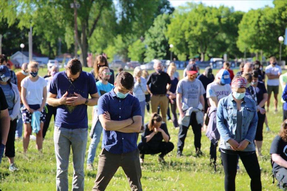 PHOTO: An interdenominational group of pastors and churchgoers join in prayer in Phelps Park in Minneapolis, Minn. on May 30, 2020.