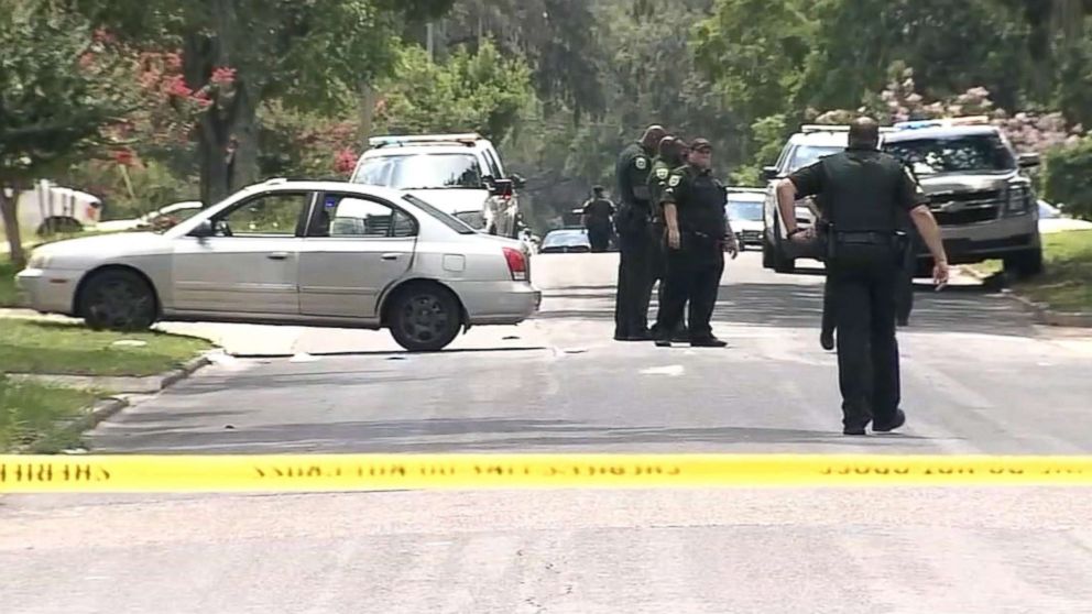 PHOTO: Police investigate the scene of a shooting in Pine Hills, Fla., that killed a pregnant woman and injured two children on July 16, 2018.