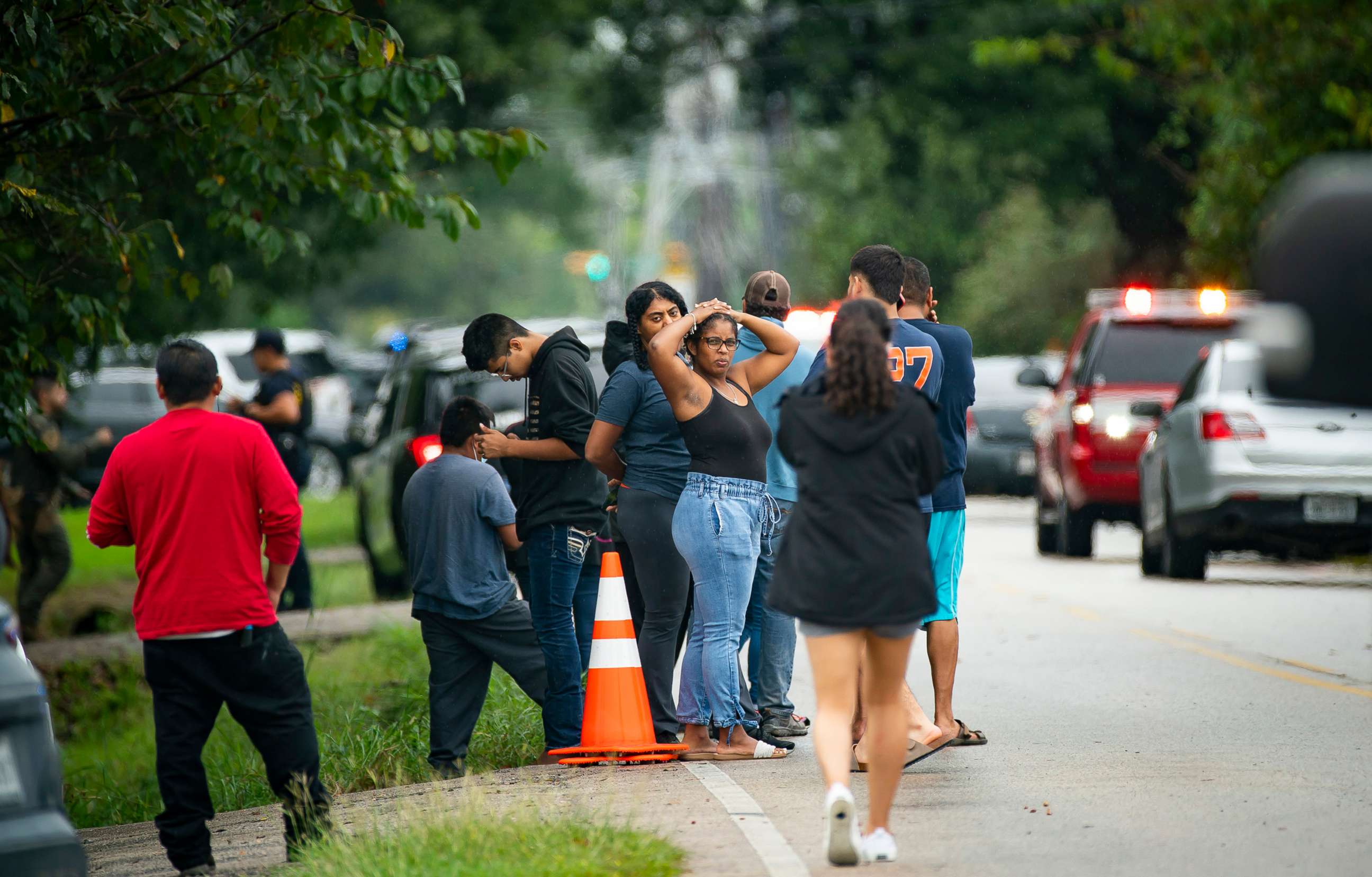 PHOTO: People gather east of YES Prep Southwest Secondary school after a shooting, Oct. 1, 2021, in Houston. 