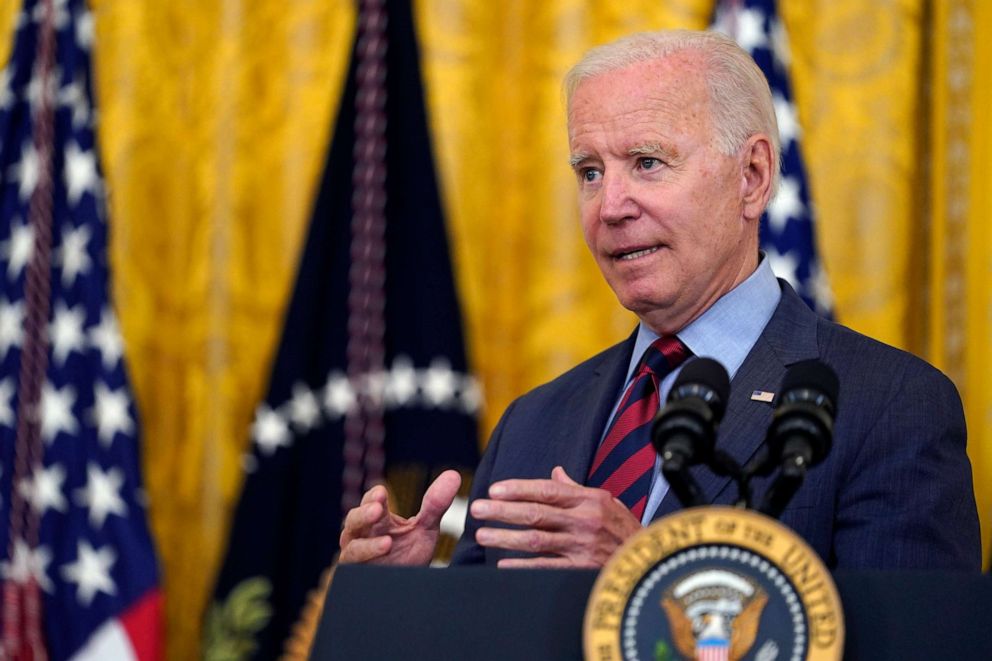 PHOTO: President Joe Biden answers a question from a reporter as he speaks about the coronavirus pandemic in the East Room of the White House in Washington, Aug. 3, 2021.