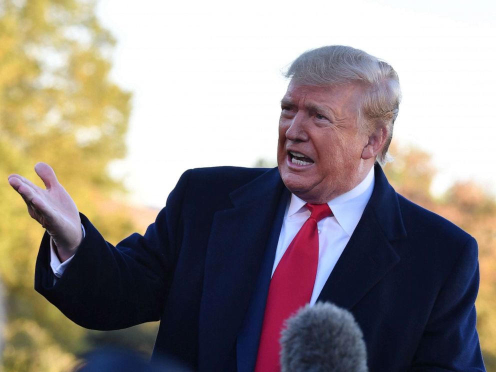 PHOTO: President Donald Trump talks to journalists before departing the Whithe House to attend a Keep America Great rally in Tupelo, Mississippi, Nov. 1, 2019.
