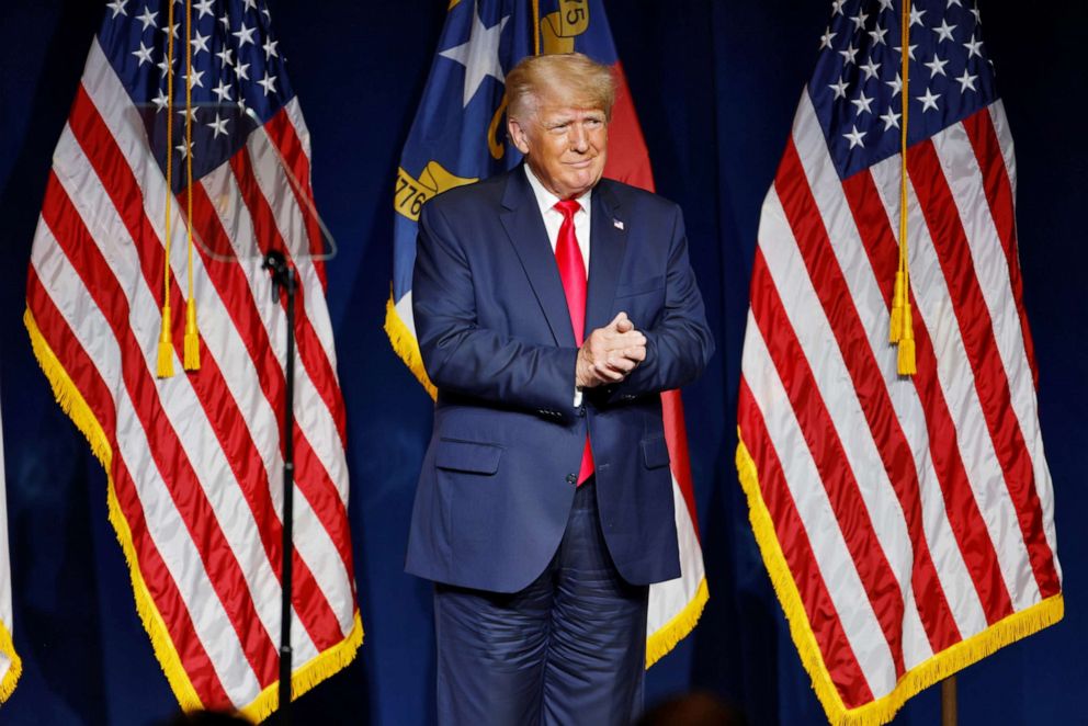 PHOTO: Former President Donald Trump stands on stage during an appearance at the North Carolina GOP convention dinner in Greenville, North Carolina, June 5, 2021.