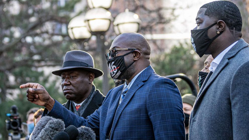 PHOTO: George Floyd's brother Philonise Floyd, center, speaks during a press conference outside the Hennepin County Government Center before the opening statement of former Minneapolis Police officer Derek Chauvin on March 29, 2021 in Minneapolis.