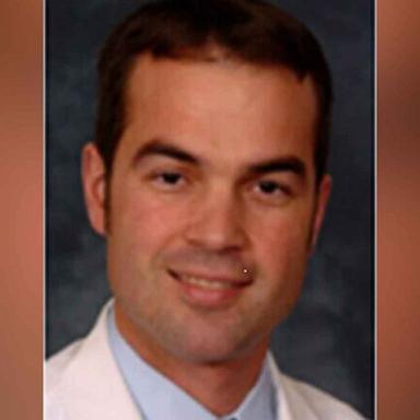 A man in an "intimate relationship" with a Michigan neurosurgeon has been charged in the doctor's slaying, authorities announced Wednesday.