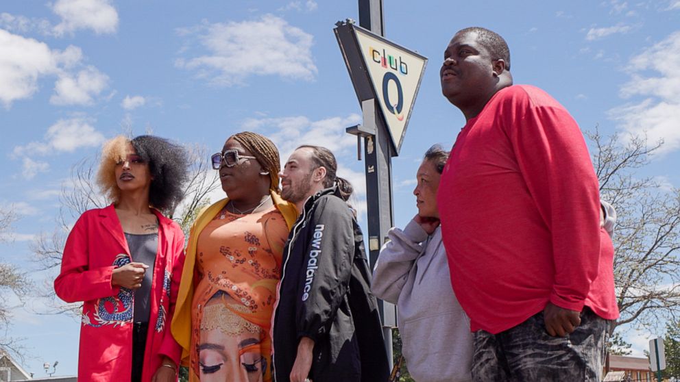 PHOTO: Tiara Latrice Kelley looks at the Club Q memorial in Colorado Springs, Colo., with her close friends and family.