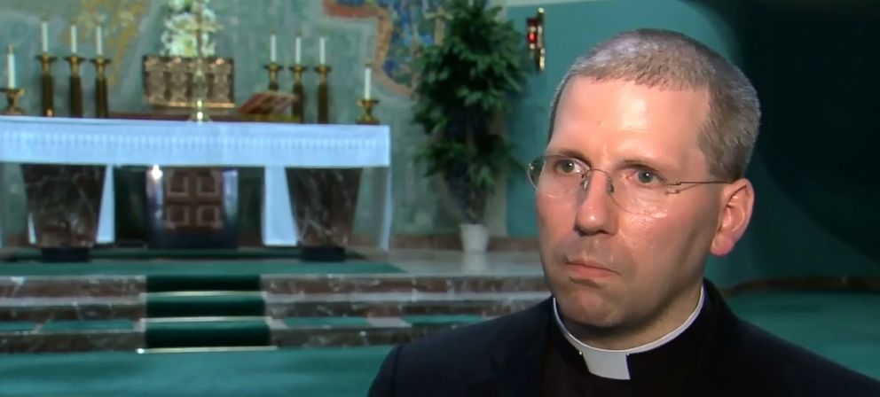 PHOTO: Father Matthew Compton, 41, a Chicago priest spoke to media after a burglar confronted him in his rectory Friday night. 