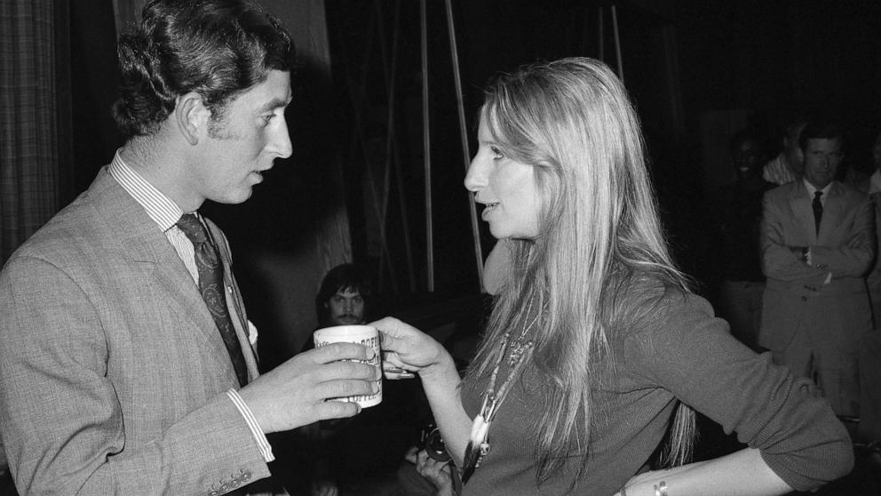 PHOTO: Prince Charles meets with singer Barbra Streisand at the Warner Bros. studio, March 19, 1974 in Los Angeles.