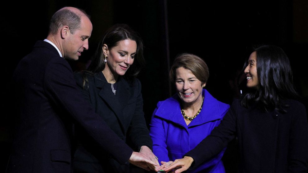 PHOTO: Britain's Prince William and Catherine, Princess of Wales and Mayor of Boston Michelle Wu turn the lights on on Boston City Hall, in Boston, Nov. 30, 2022.
