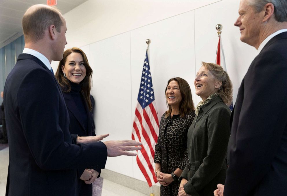 PHOTO: Prince William, Prince of Wales and Catherine, Princess of Wales are greeted by First Lady Lauren Baker and Governor Governor Charlie Baker as they arrive at Logan International Airport on Nov. 30, 2022, in Boston.