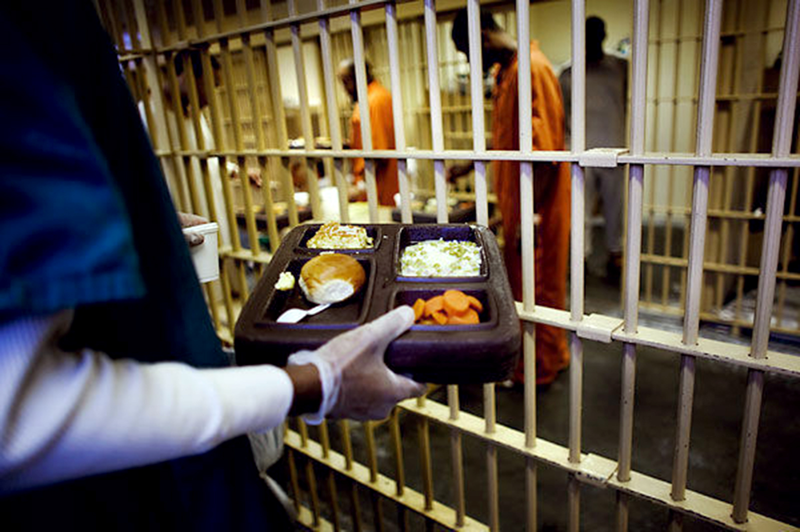 PHOTO: Inmates at the Virginia Beach City jail receive their meals in August 2019.