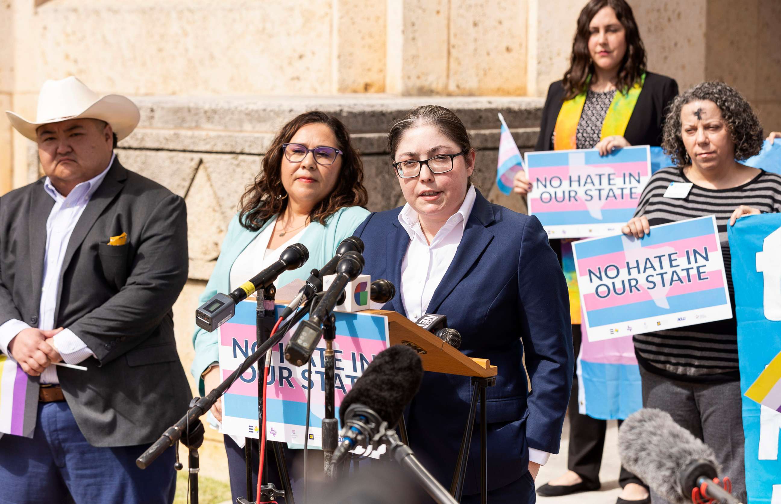 PHOTO: LGBTQ leaders speak outside the Travis County courthouse where a hearing was held to stop the newly mandated child welfare investigations targeting families of transgender children, Mar. 2, 2022 in Austin, Texas.