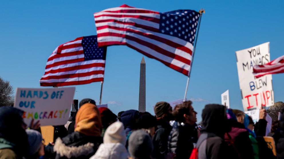 PHOTO: Protesters rally against the Trump administration during "Not My President's Day" protests at the Capitol Reflecting Pool, Feb. 17, 2025 in Washington.