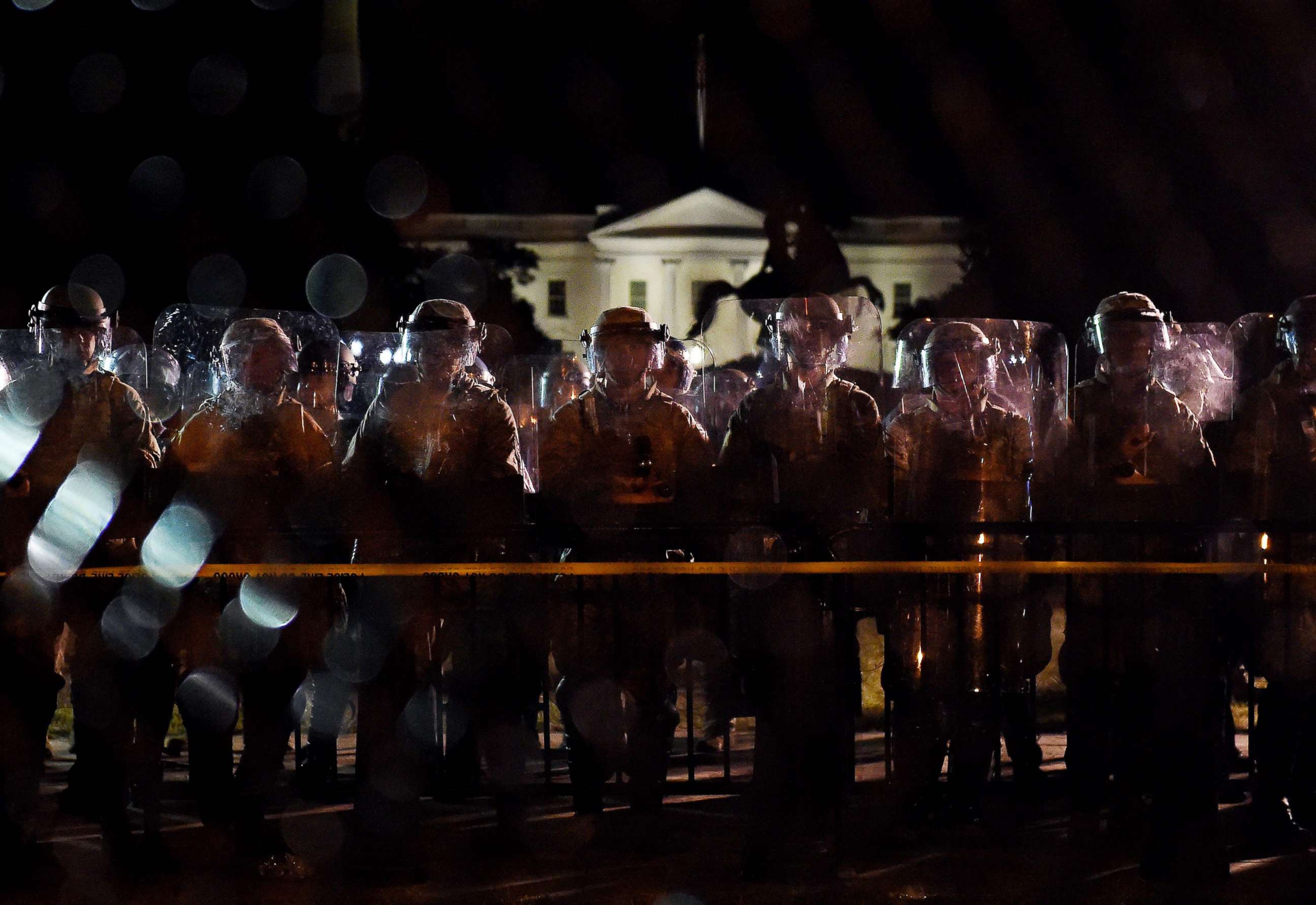 PHOTO: Police hold a perimeter near the White House as demonstrators gather to protest the death of George Floyd while in police custody, June 2, 2020, in Washington, D.C.