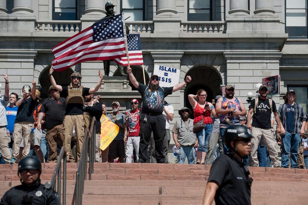 PHOTO: Right-wing demonstrators taunt counter-demonstrators during the Denver "March Against Sharia Law" in Denver, Colo., June 10, 2017.
