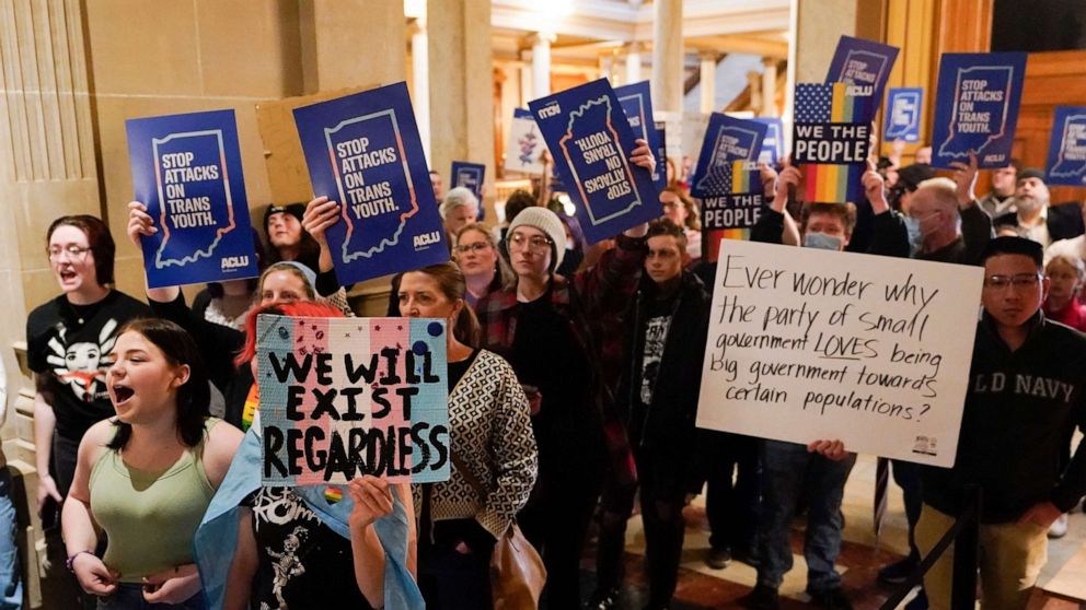 PHOTO: Protesters stand outside of the Senate chamber at the Statehouse, Feb. 22, 2023, in Indianapolis.